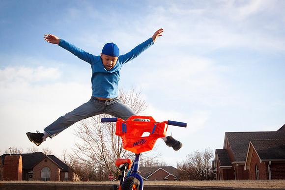 jumping on the bike