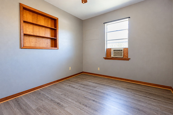 Empty Gray Bedroom re